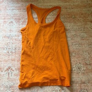 Orange lululemon swiftly tech